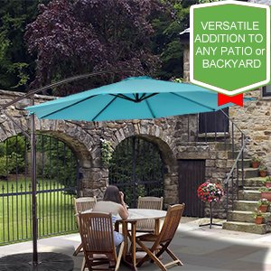 Offset cantilever patio umbrella shading a stone patio