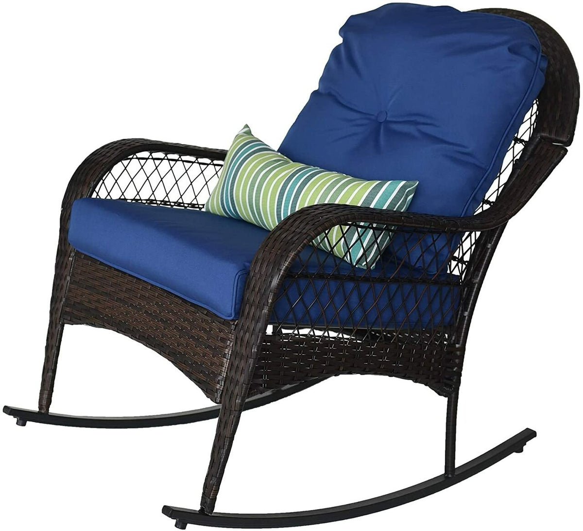 Outdoor wicker rocking chair, three-quarter view, navy seat cushion and striped throw pillow on white