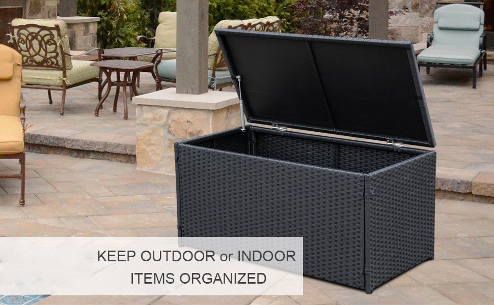 Wicker deck storage box, open, on a furnished patio